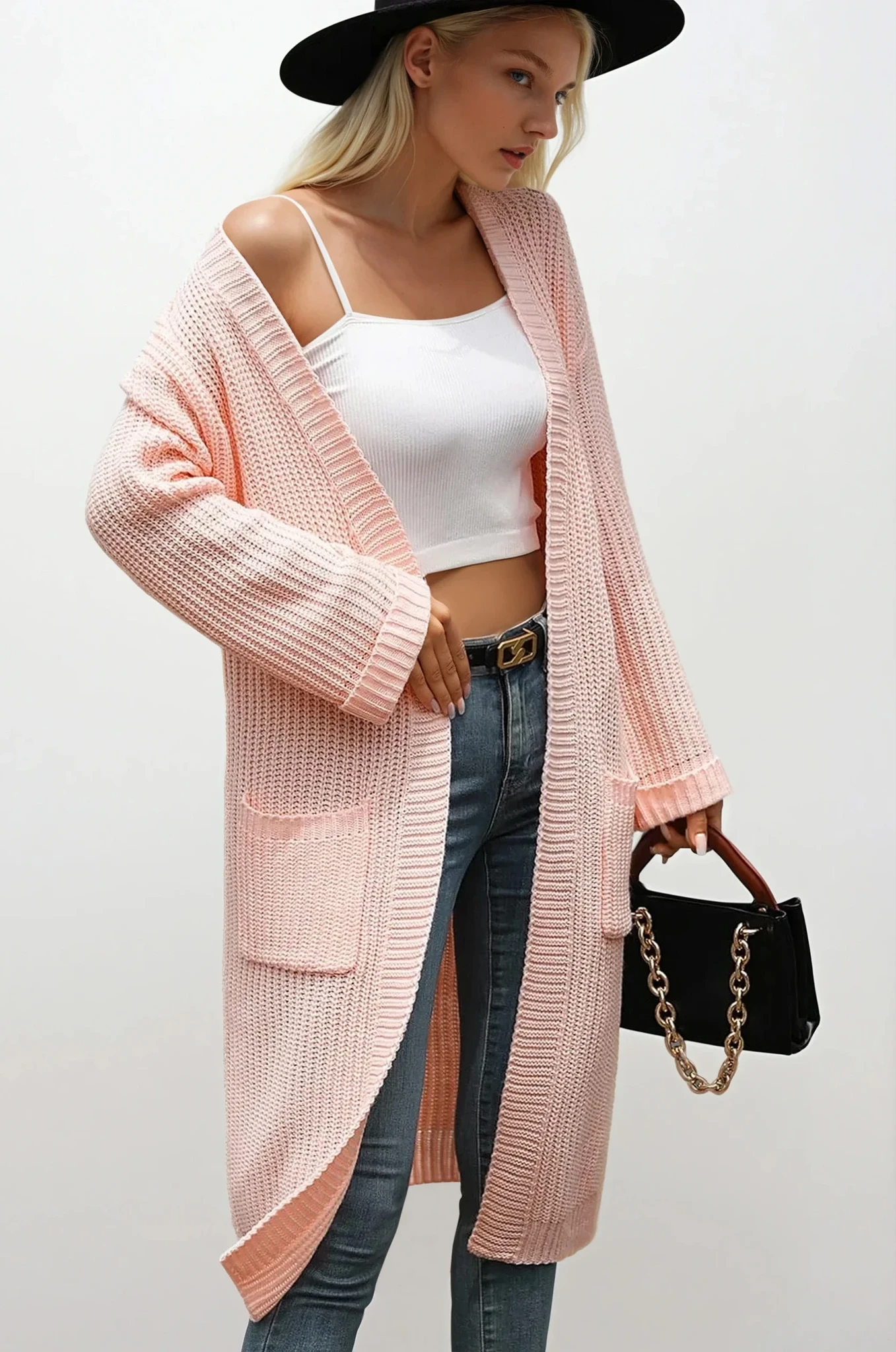 Cream Vogue open front cardigan by Trendsi, shown laid flat with long sleeves and ribbed edges, soft knit fabric for casual wear.