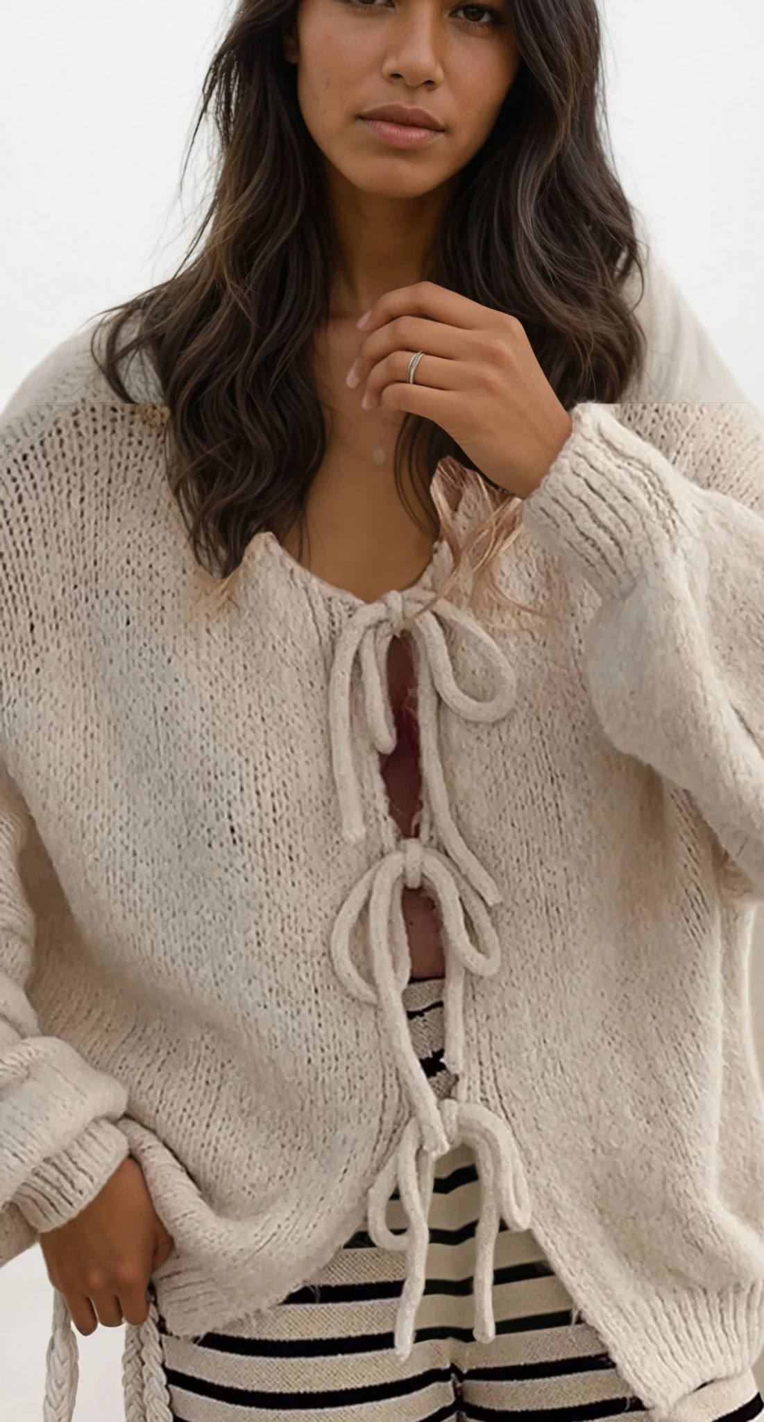 Triple tied cardigan with adjustable ties and solid pattern