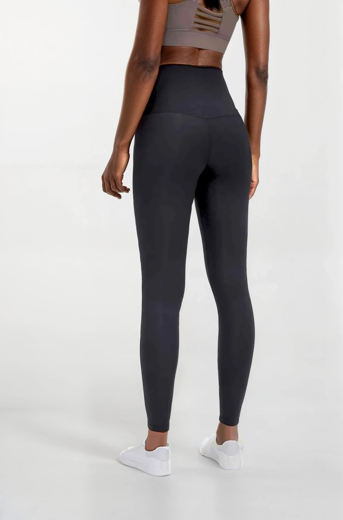 woman wearing ultra soft high-waist black leggings