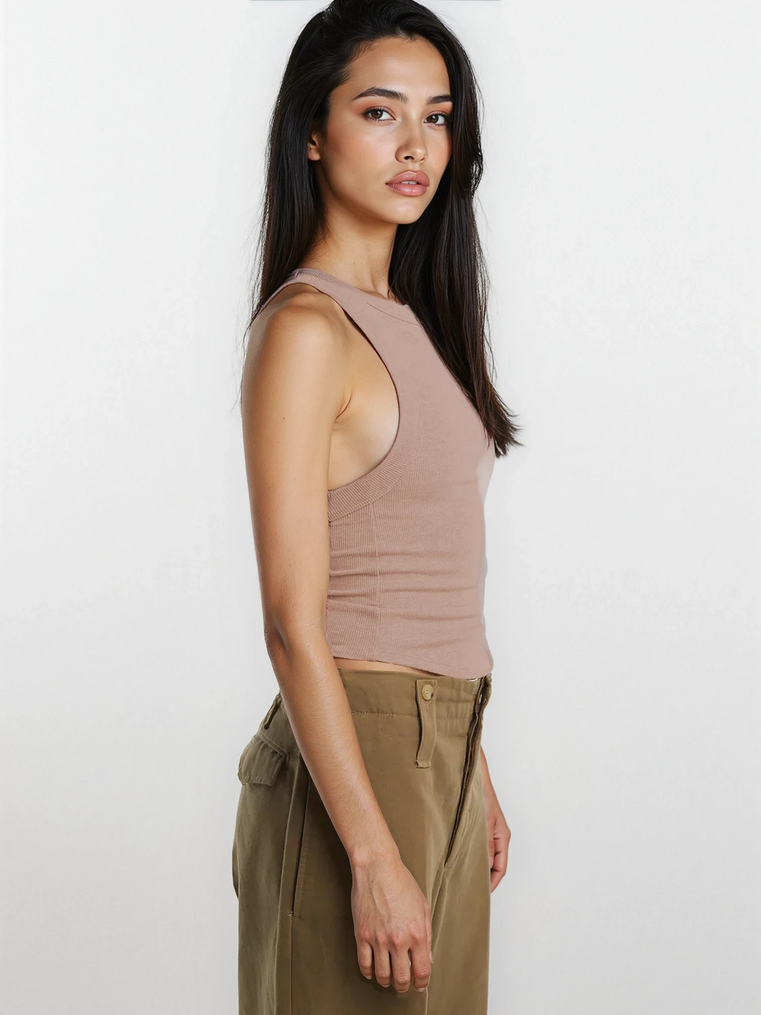 Light blue rib-knit halter neck sleeveless cropped tank top from Trendsi, featuring a fitted halter style and sleeveless design.
