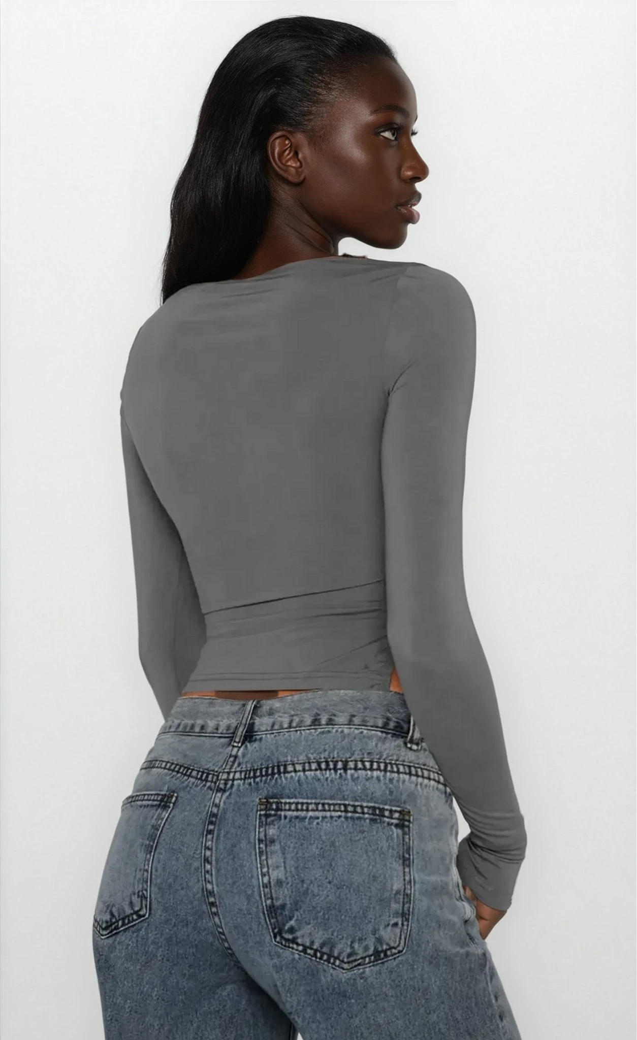 Light-colored tied slit round neck long sleeve shirt from Trendsi, featuring a relaxed fit and stylish design.