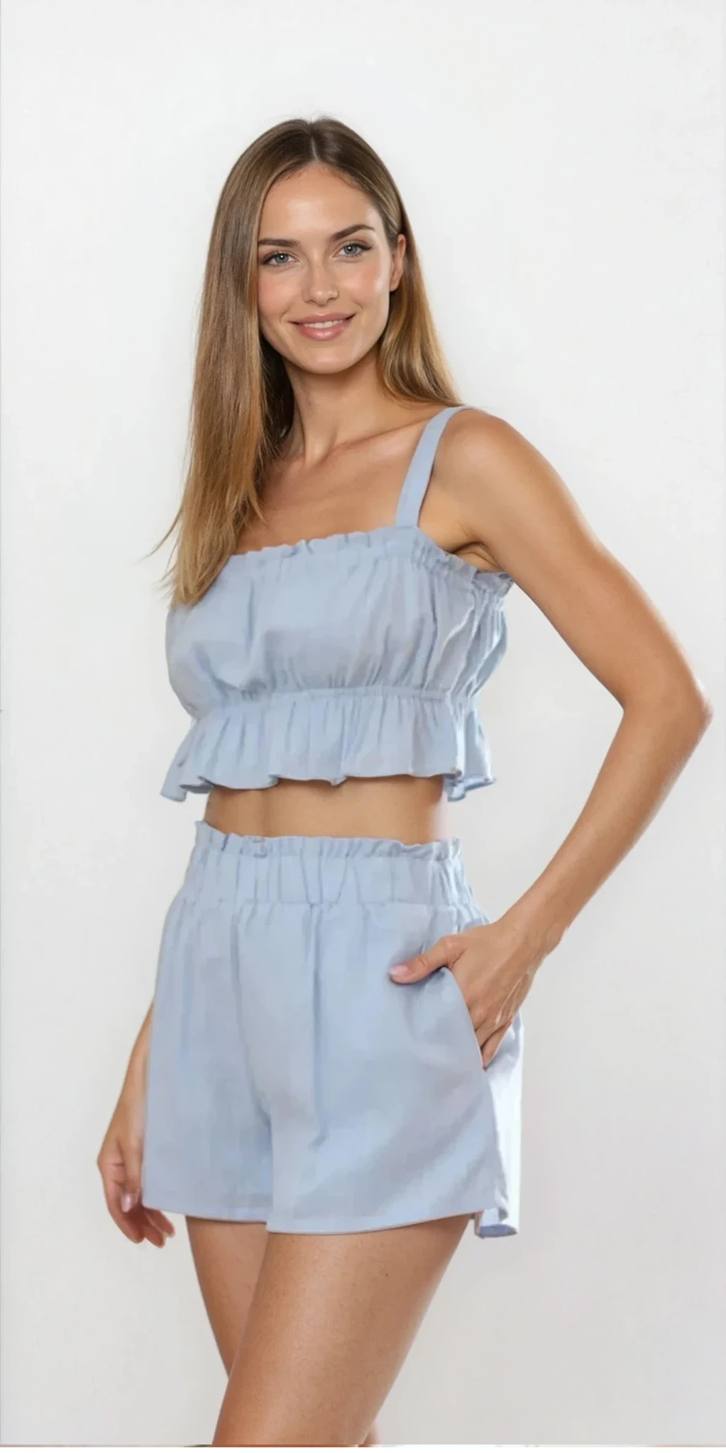 Ines Ruffle Square Neck Cami and Shorts set by Trendsi, featuring a light-colored ruffled square neckline top with matching shorts.