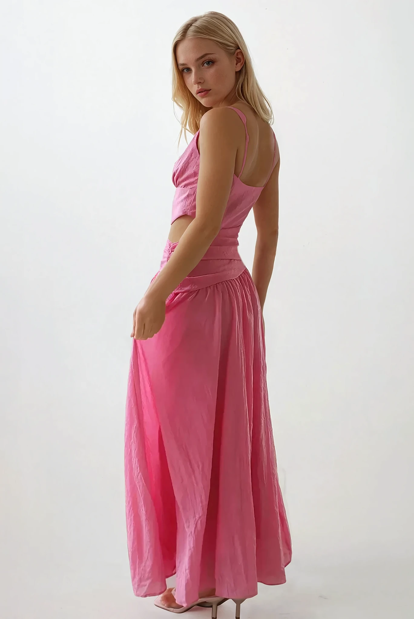 Light-colored Slipstream Cutout V-Neck Sleeveless Maxi Dress by Trendsi, featuring a flowy silhouette and stylish cutout details.