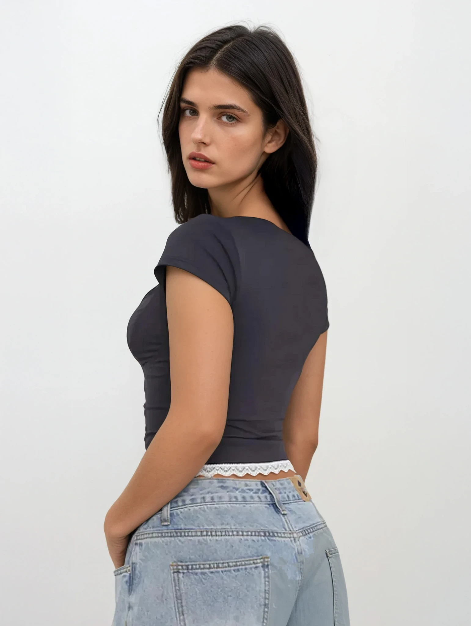 Light blue lace sweetheart neck short sleeve blouse from Trendsi, showing detailed lace fabric and elegant neckline.