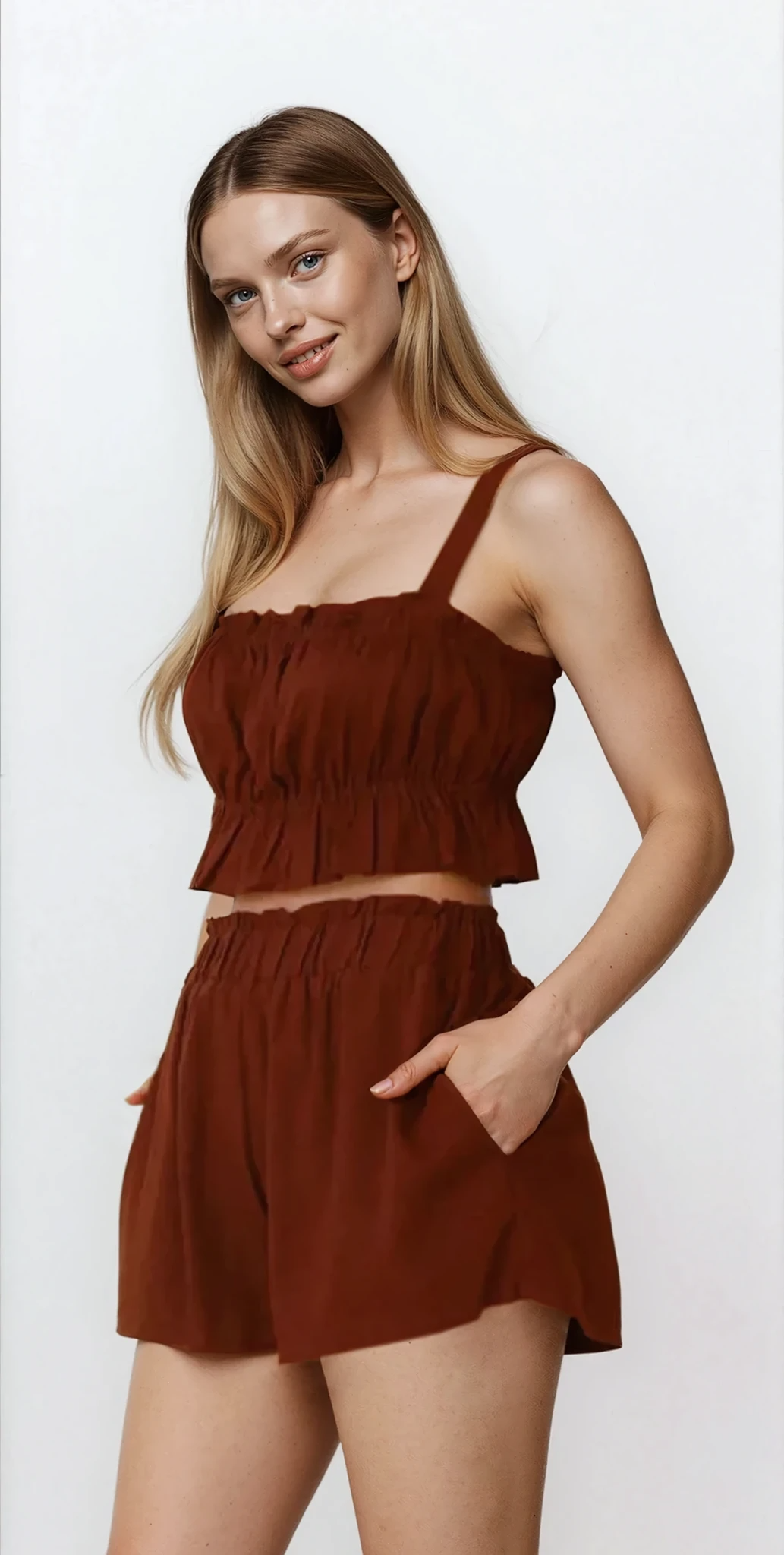 Ines Ruffle Square Neck Cami and Shorts set by Trendsi, light-colored fabric with ruffle accents, sleeveless top and matching shorts.