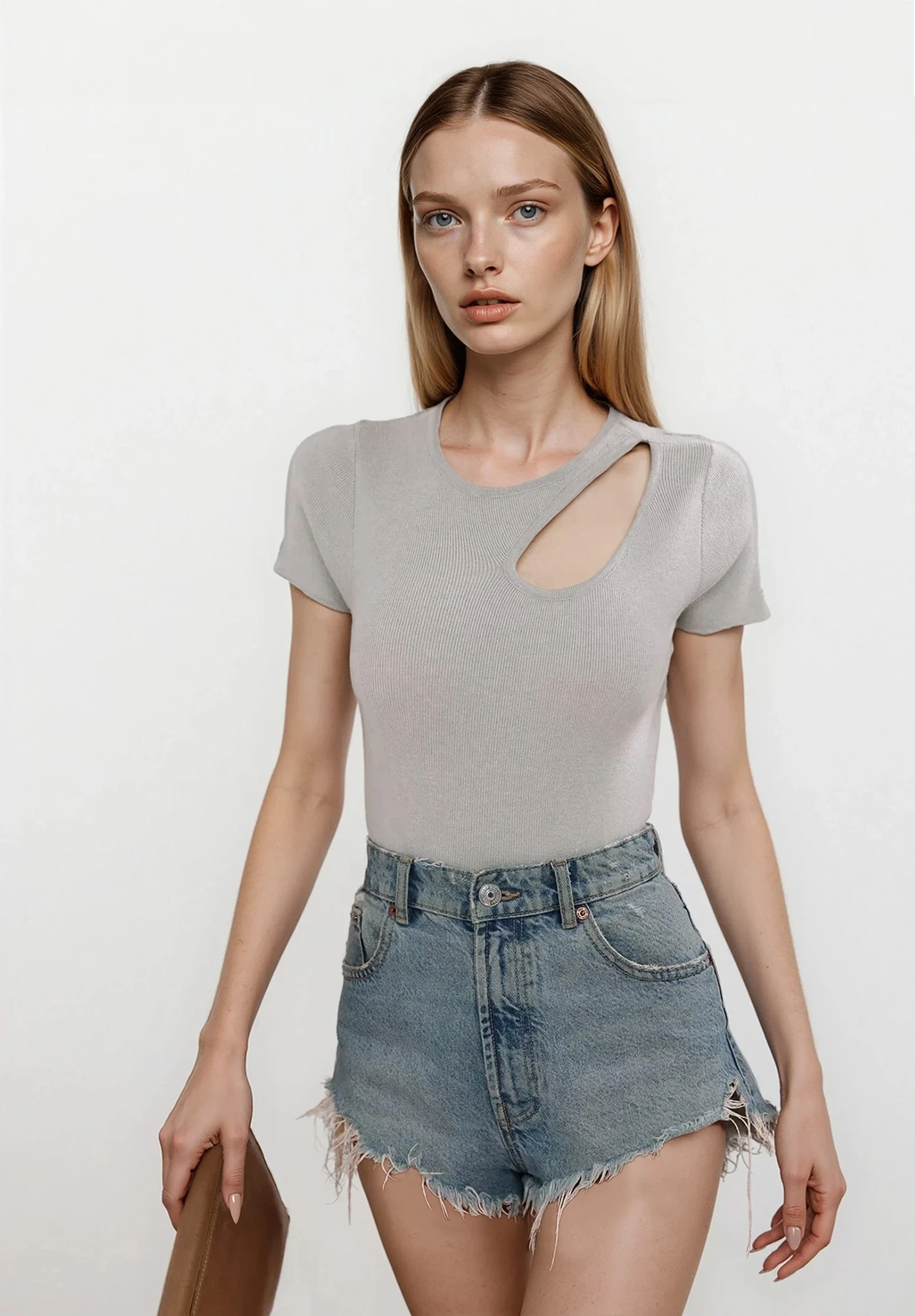 Light blue Luxe Cutout Round Neck Short Sleeve Knit Top by Trendsi, featuring stylish cutouts on a fitted knit fabric.
