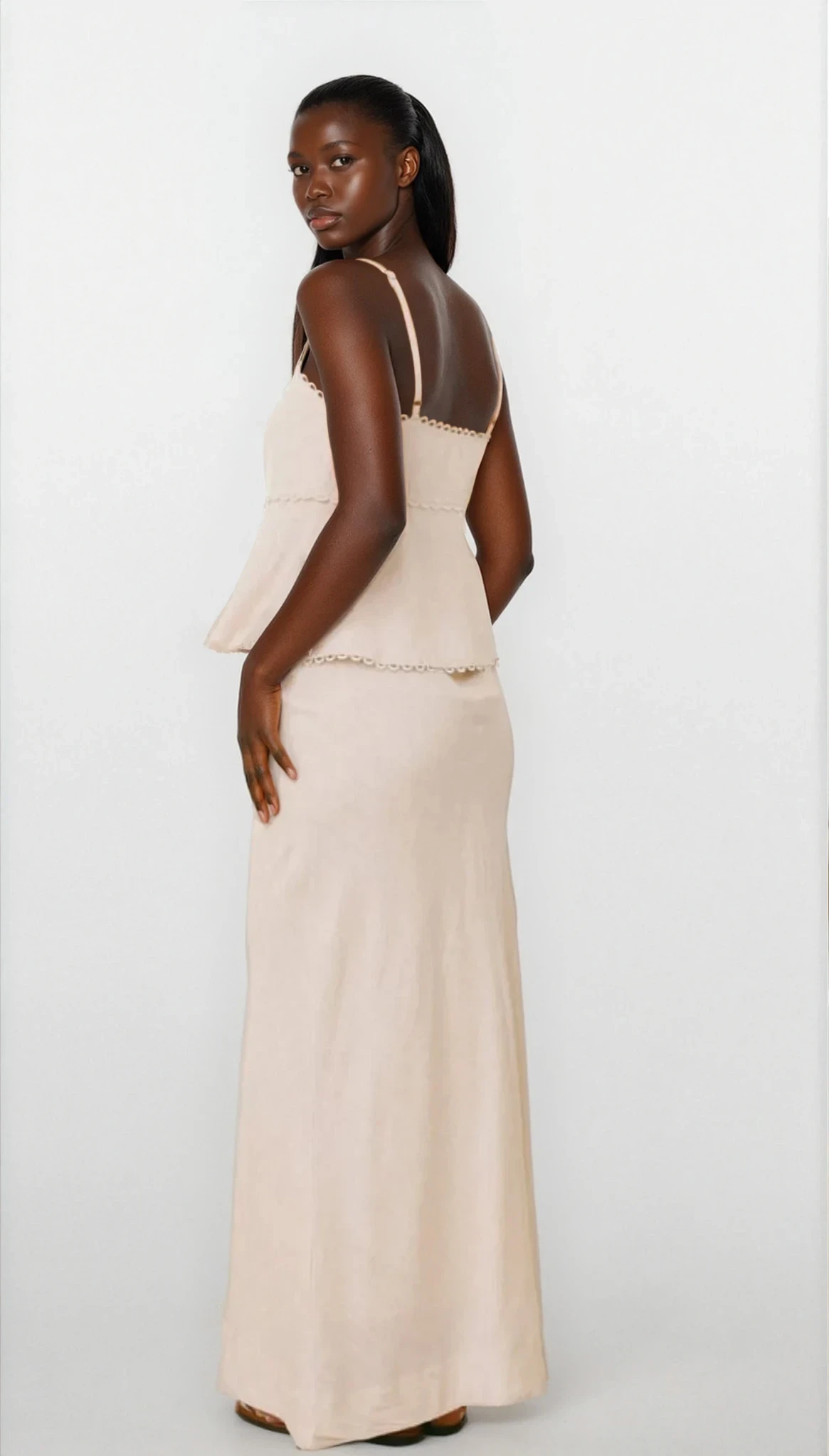 Elara Lace Trim Button Front Cami and Skirt Set by Trendsi, featuring delicate lace details and a stylish button-front design.