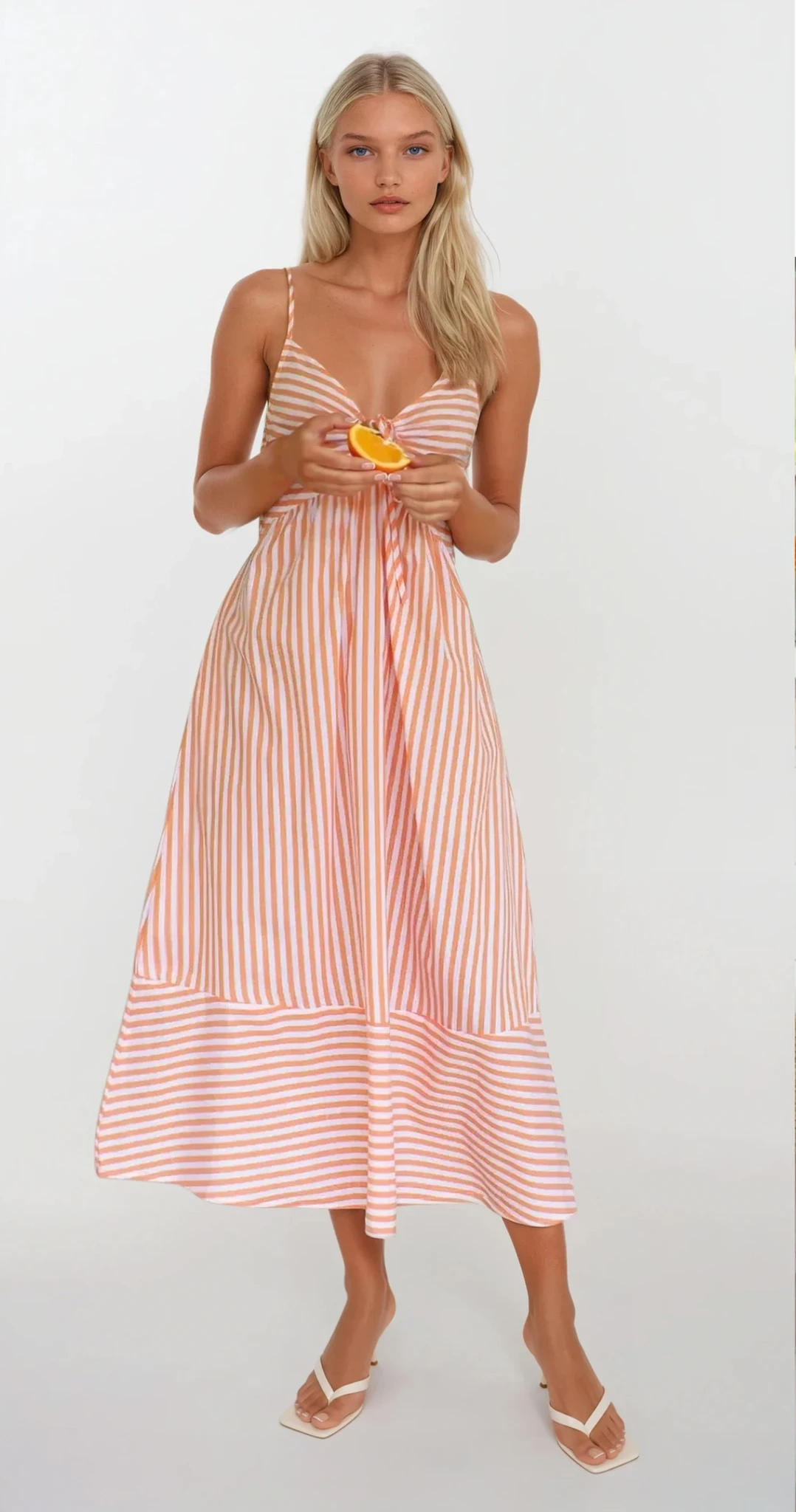 Sunset Stripe Cami Midi Dress by Trendsi showing a lightweight, sleeveless dress with a vibrant sunset stripe pattern.