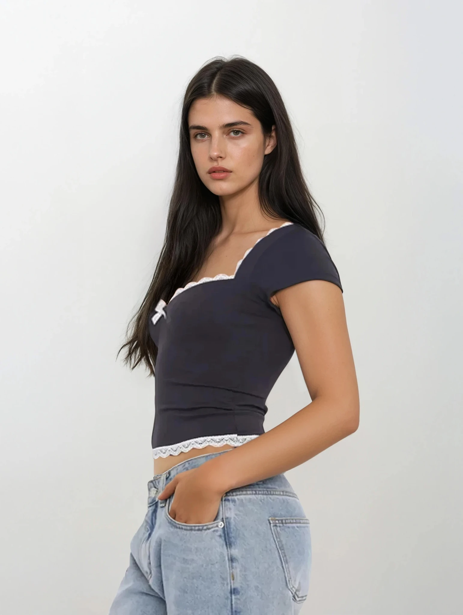 Light blue lace sweetheart neck short sleeve blouse from Trendsi, featuring delicate lace fabric and a feminine fit.