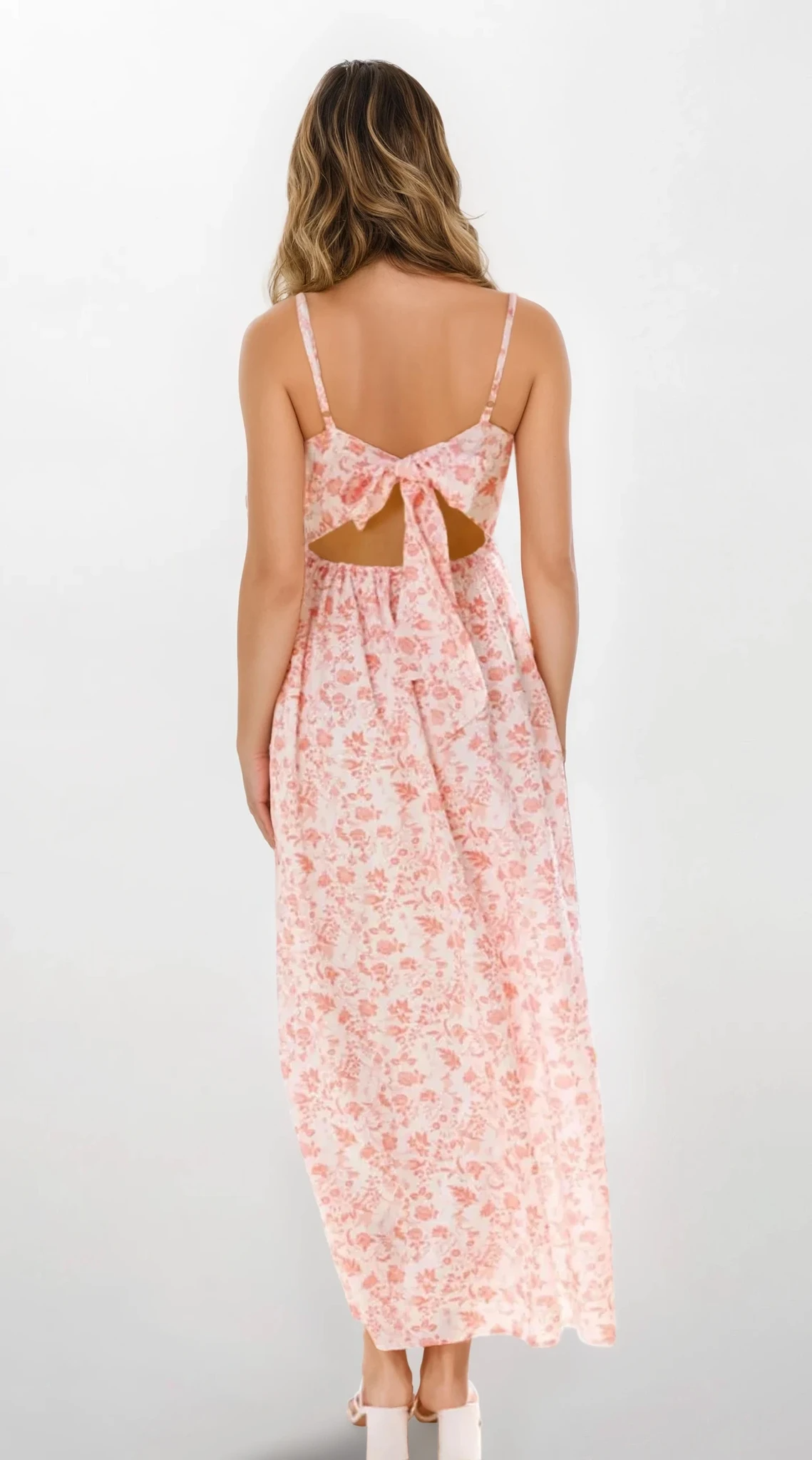 Light blue Fleuron Bow Back V-Neck Cami Dress by Trendsi, featuring a delicate bow detail and feminine V-neck design.