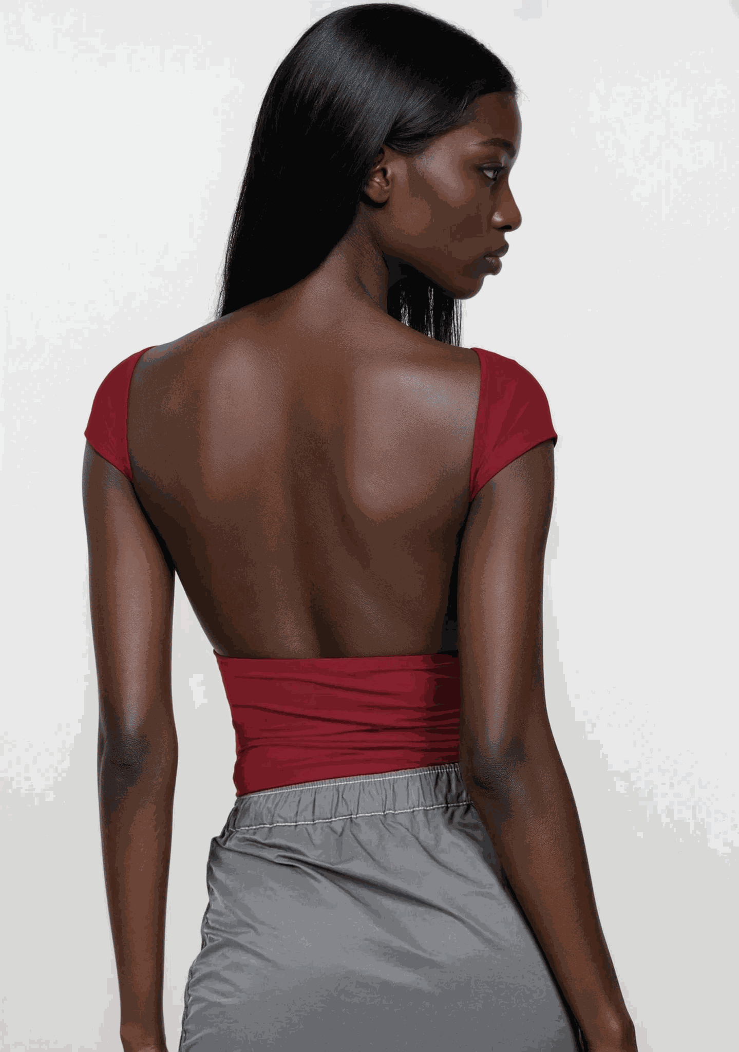 Backless short sleeve cropped blouse on mannequin