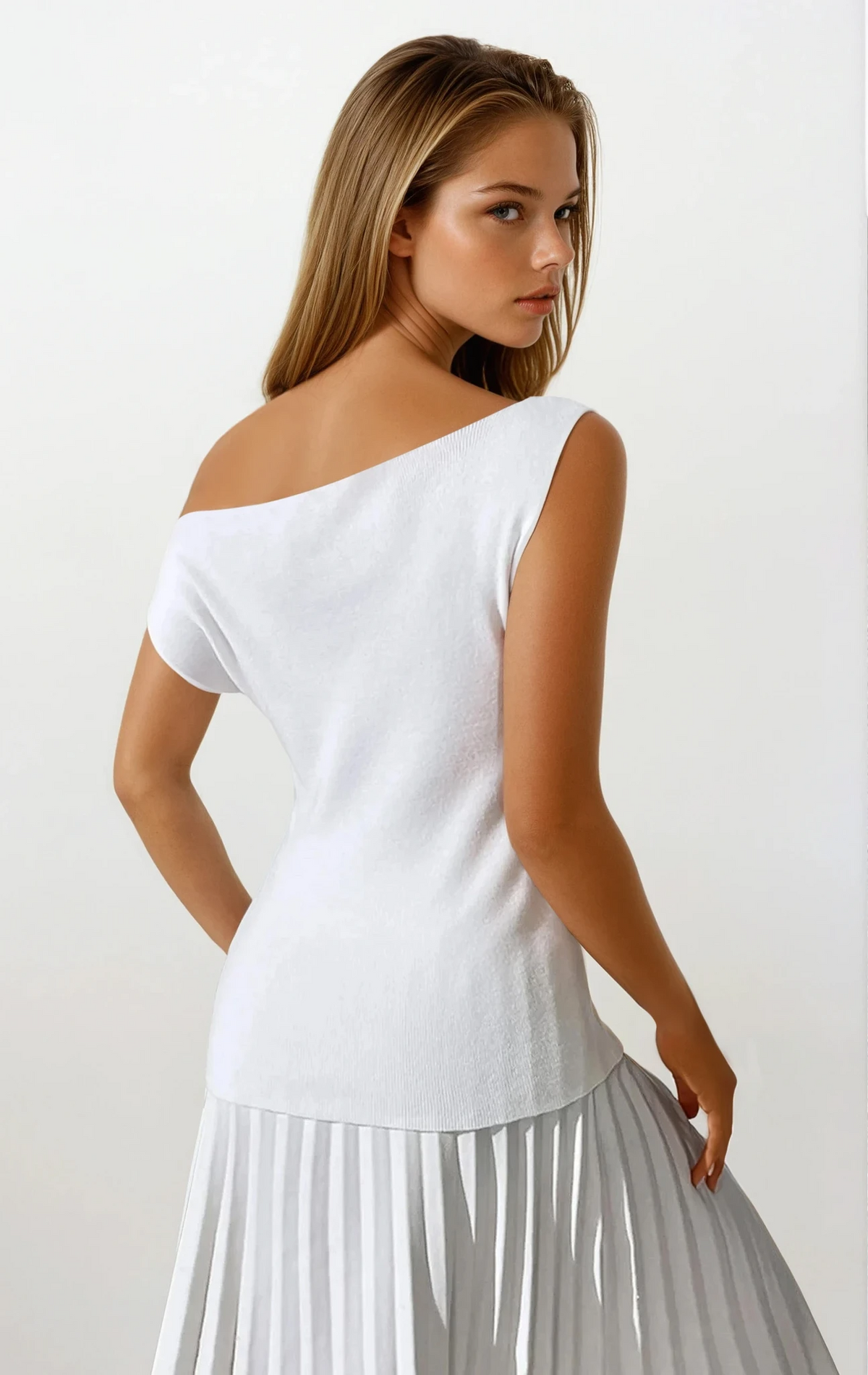 Sleeveless cold shoulder knit top with diagonal neckline