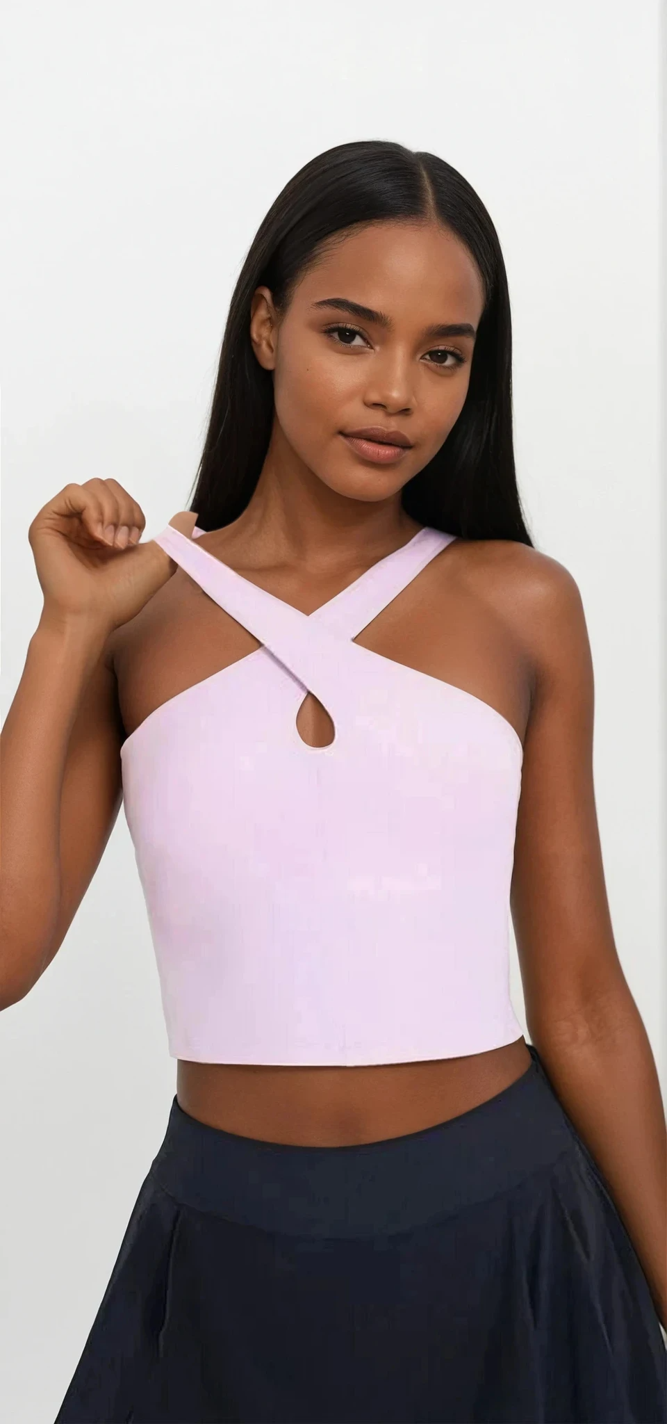 Light blue Crisscross Grecian Neck Cami by Trendsi featuring a stylish, fitted design with crisscross straps and a sleeveless cut.