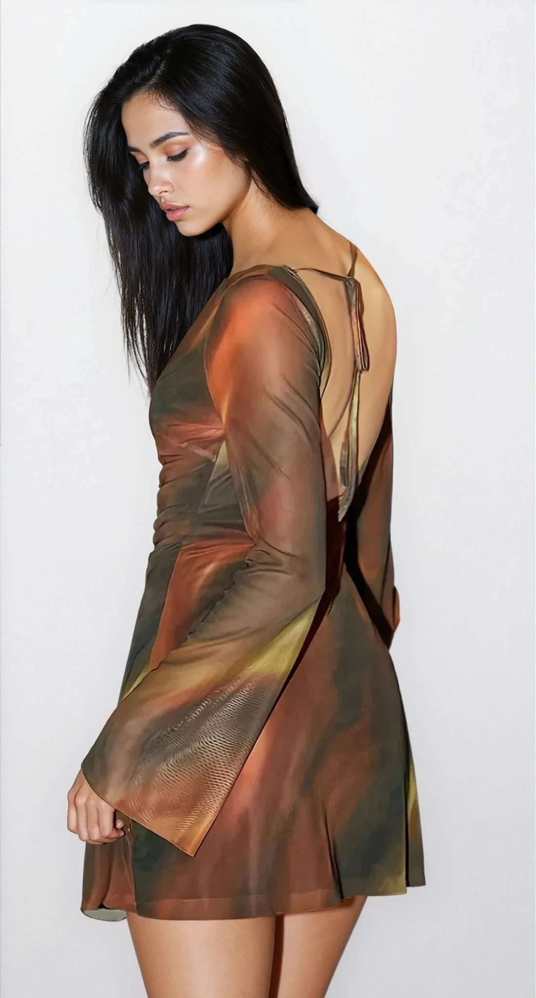 Volcanic Bodycon long sleeve mini dress by Trendsi, featuring a fitted silhouette and stylish design in a vibrant color.