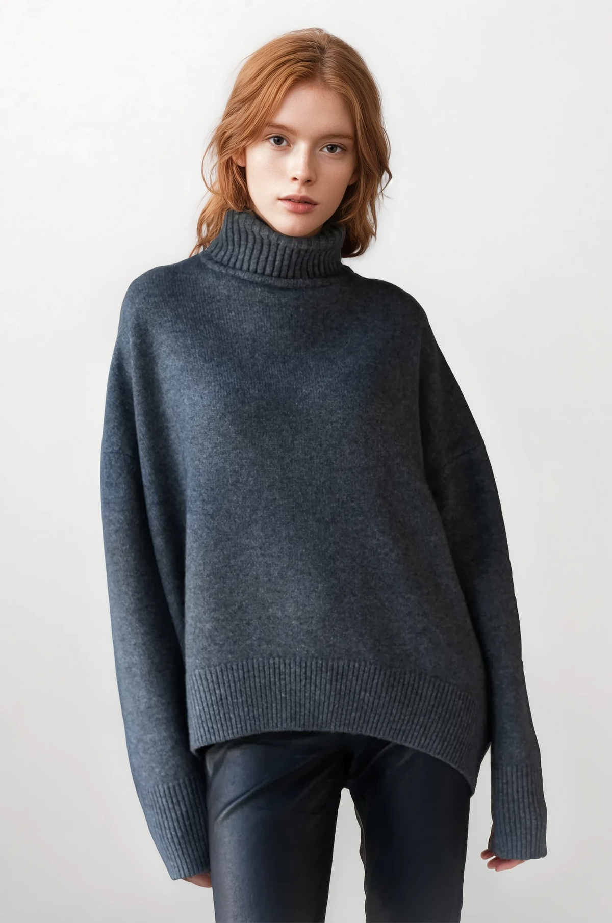 Effortless turtleneck sweater with dropped shoulders and long sleeves