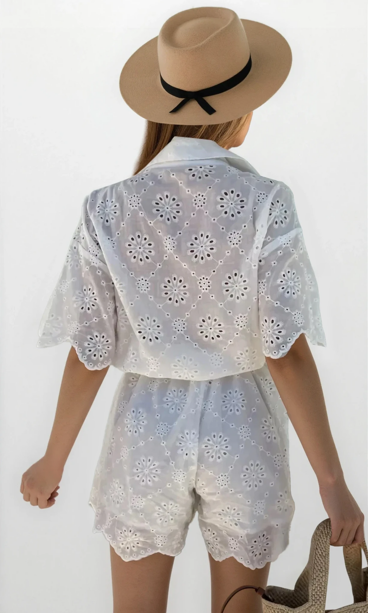 Elysia eyelet lace button-up romper with tied waist and half sleeves
