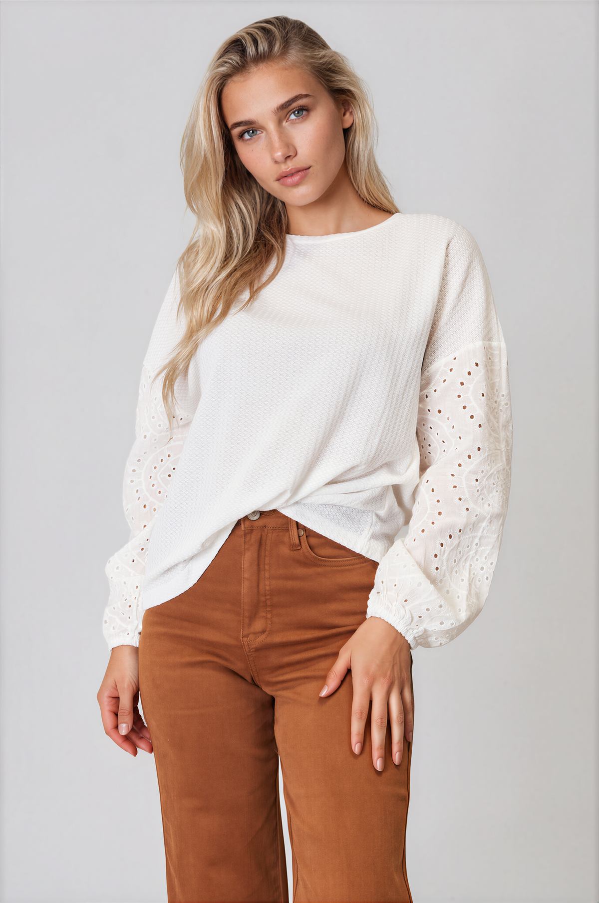 Ethereal Round Neck Eyelet Dropped Shoulder Blouse in white with long eyelet sleeves and a relaxed draped fit