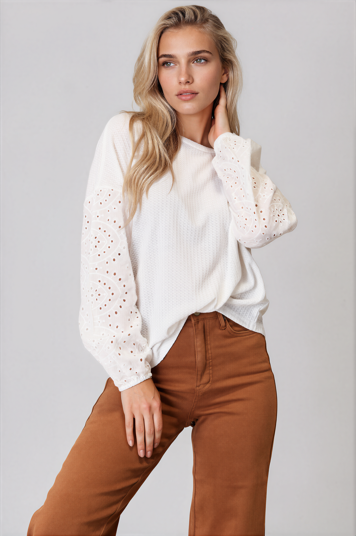 Ethereal Round Neck Eyelet Dropped Shoulder Blouse in white with long eyelet sleeves, a relaxed fit and round neck