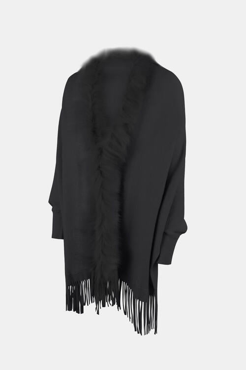 Fringe open front long sleeve poncho on model