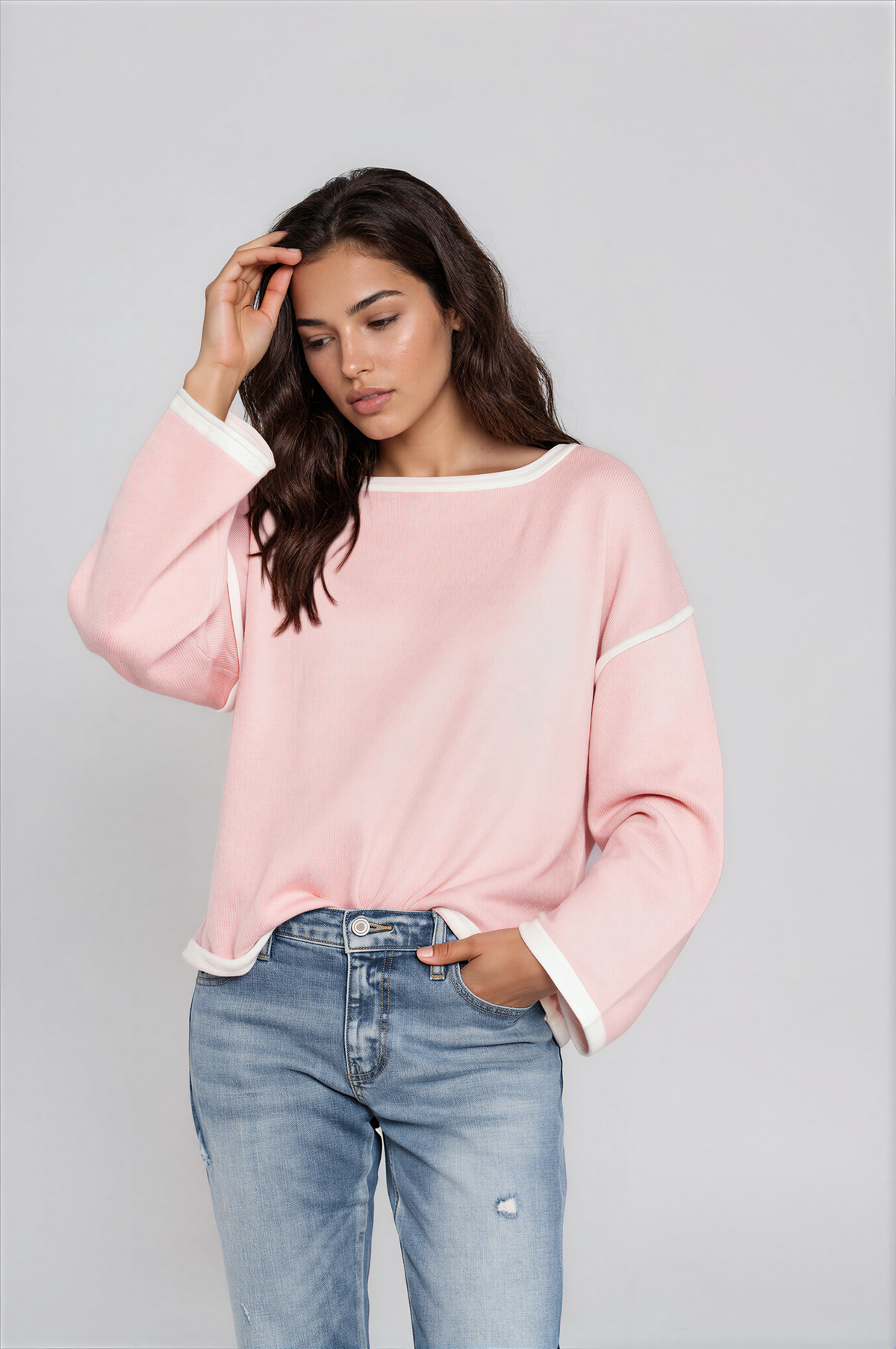 Halo Contrast Detail Dropped Shoulder Knit Top in blush pink with white contrast trim, boat neckline, and relaxed long sleeves.