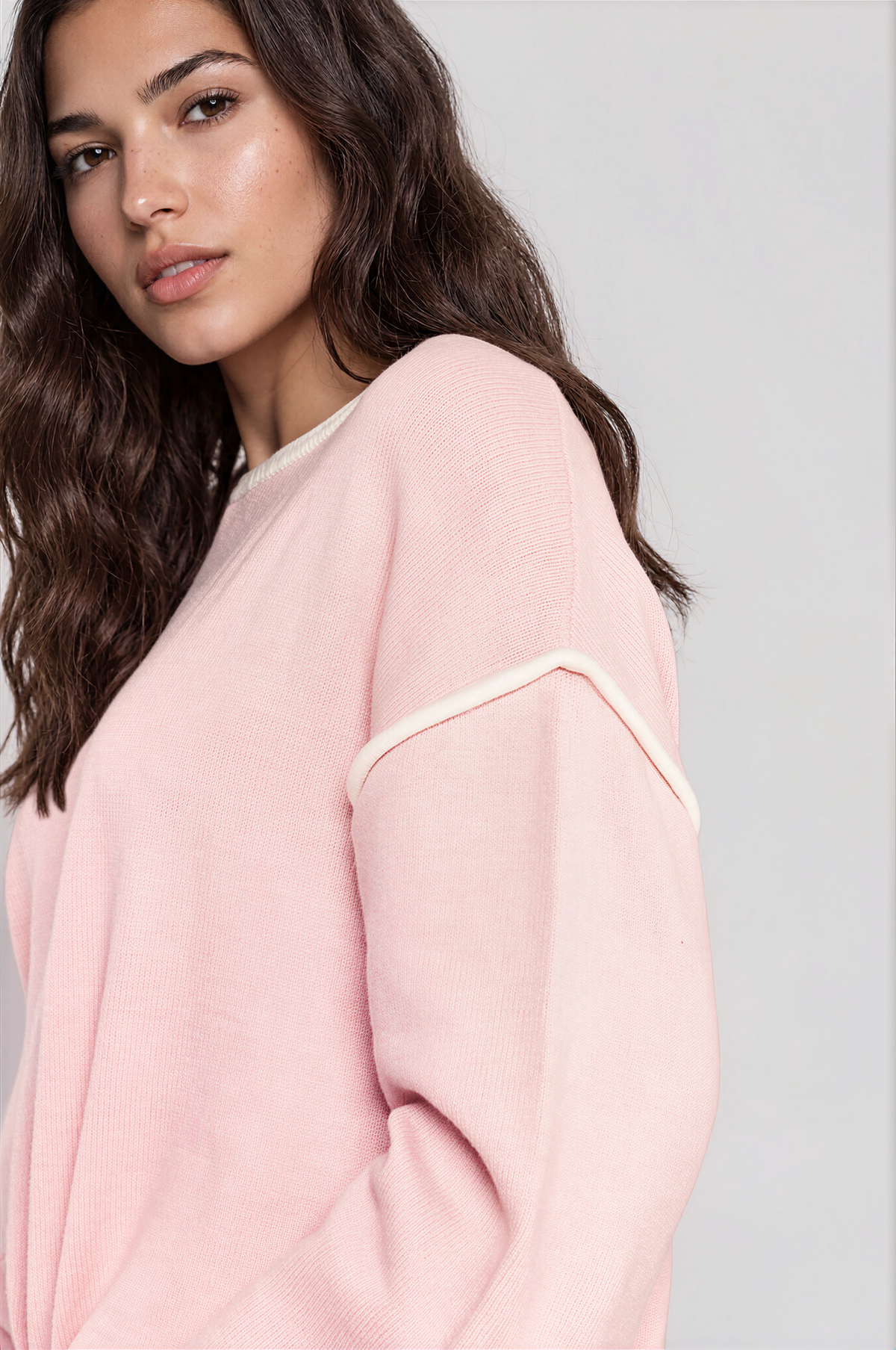 Halo Contrast Detail Dropped Shoulder Knit Top in pale pink with a fine knit texture, cream contrast trim, and relaxed long sleeves