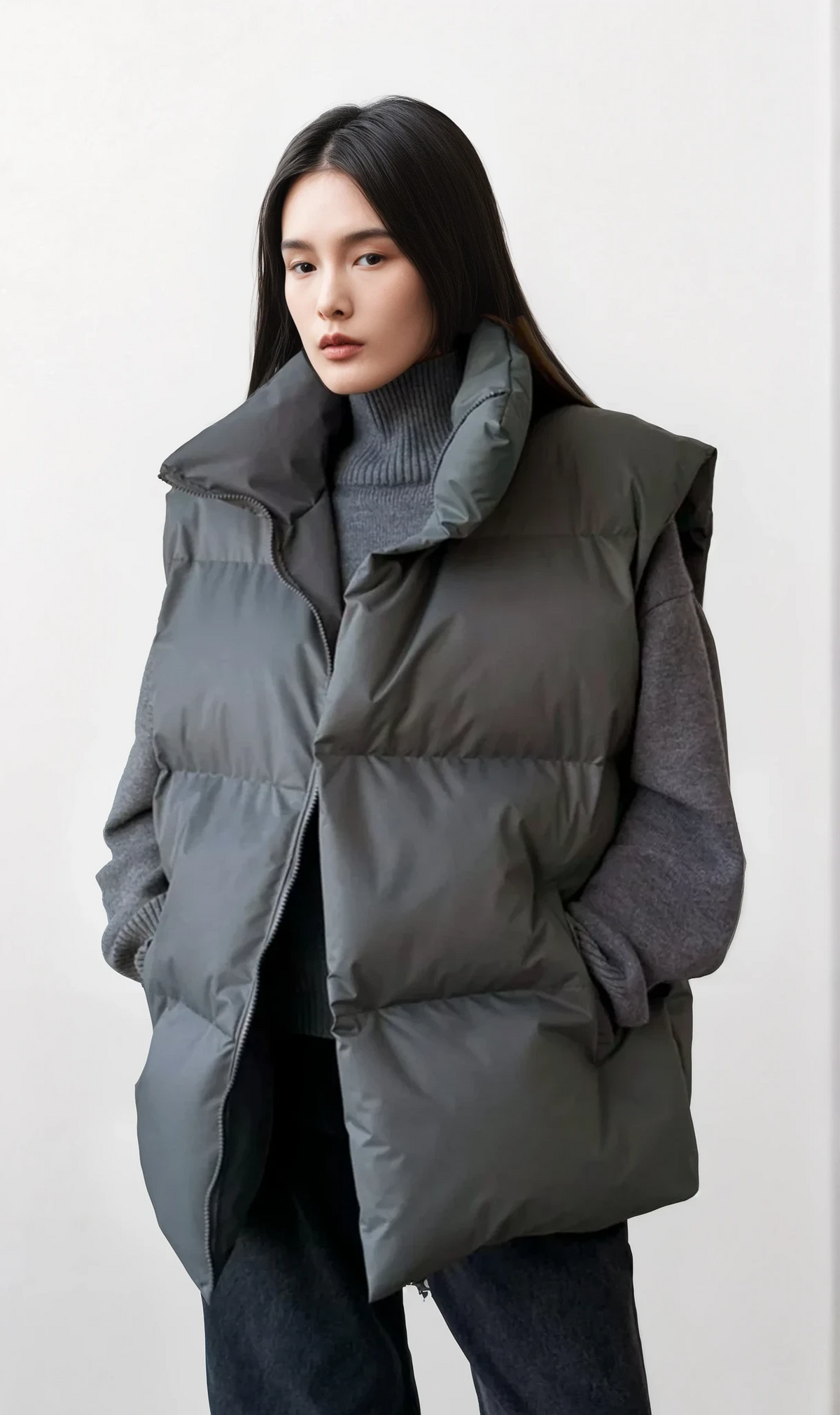 lightweight icy turtleneck puffer vest with full zip and solid pattern