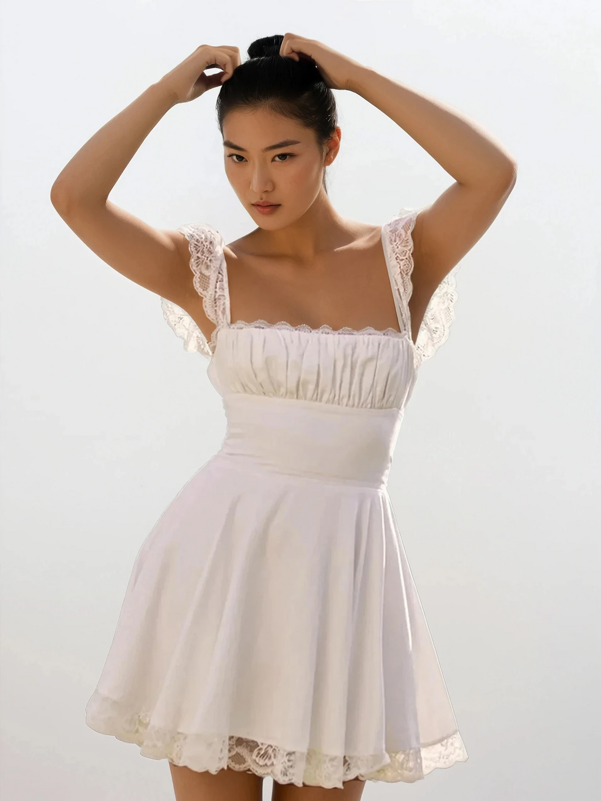 Milk Maid square neck mini dress with cap sleeves and tied back