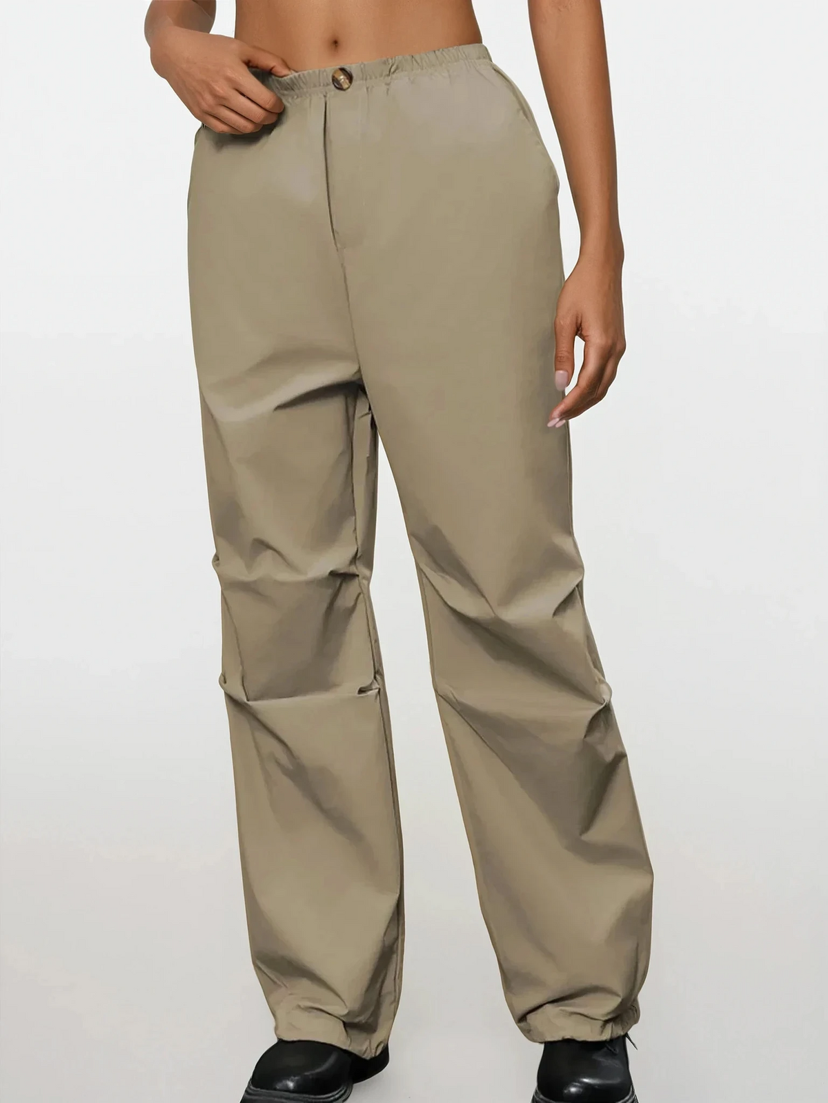 Stylish solid pattern parachute pants with button and pockets