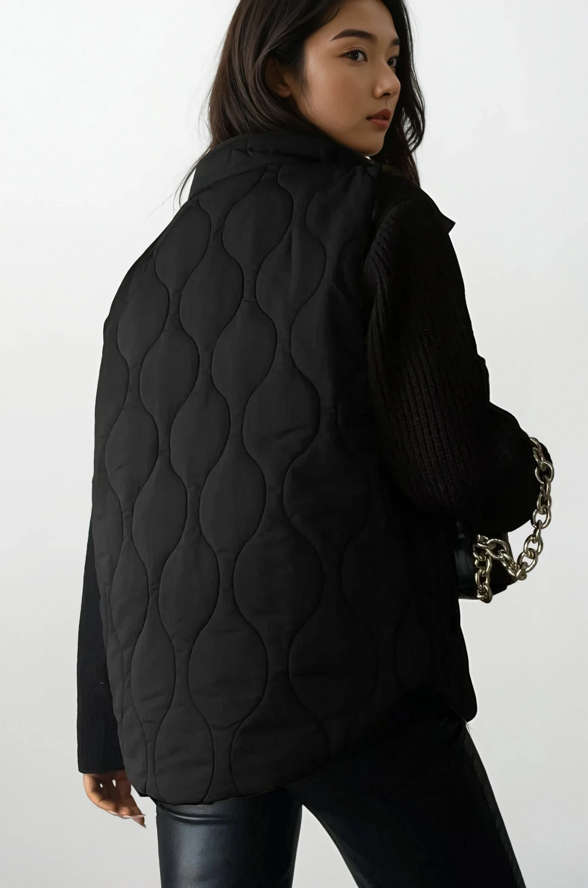 Quilted collared neck vest with sleeveless design and pockets