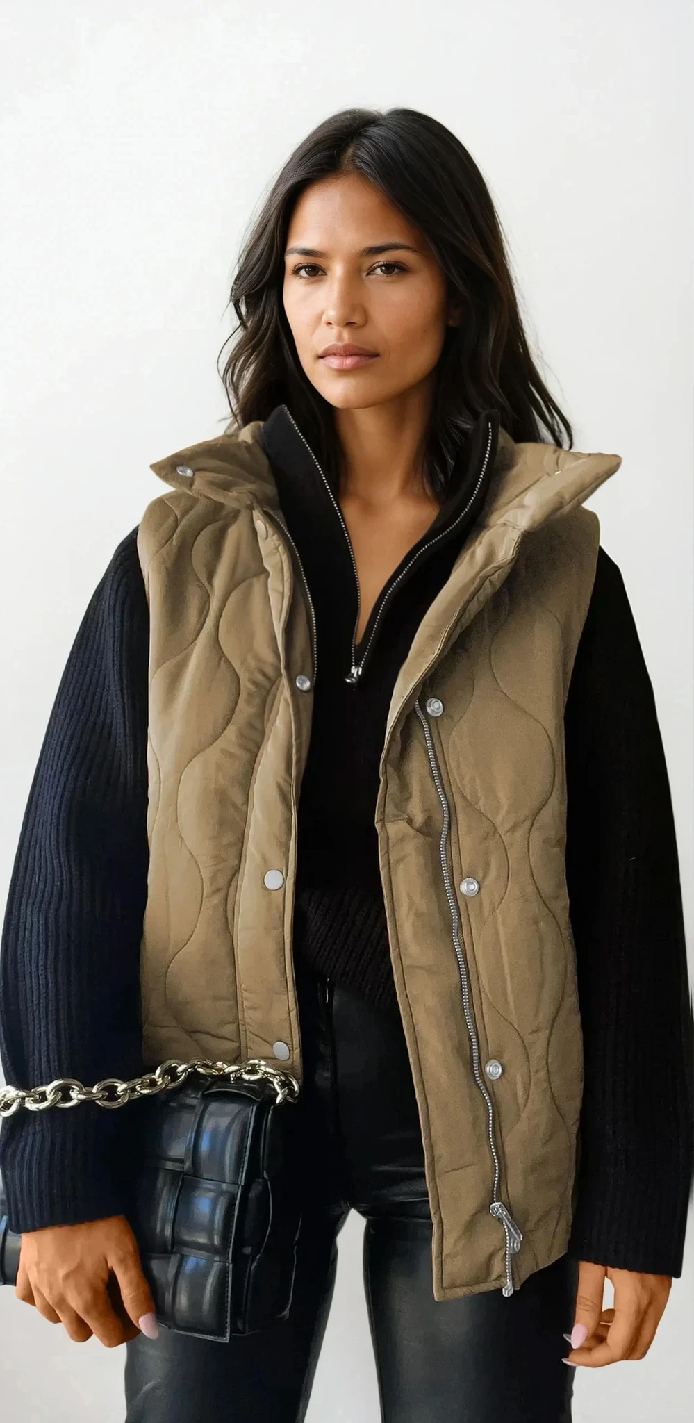 Quilted collared neck vest with pockets and sleeveless design