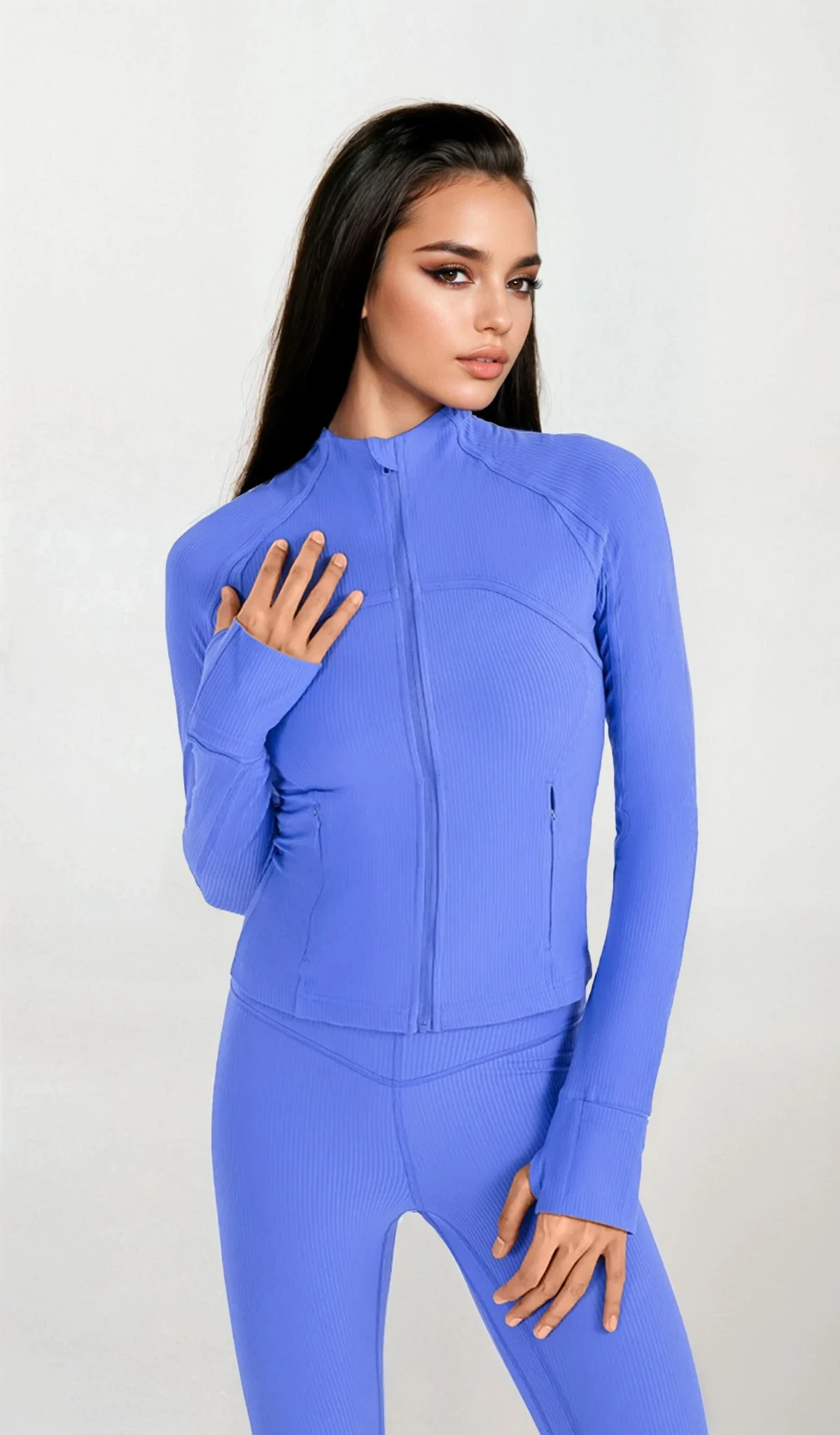 Recharge full zip long sleeve jacket with stretchy fabric and thumb holes