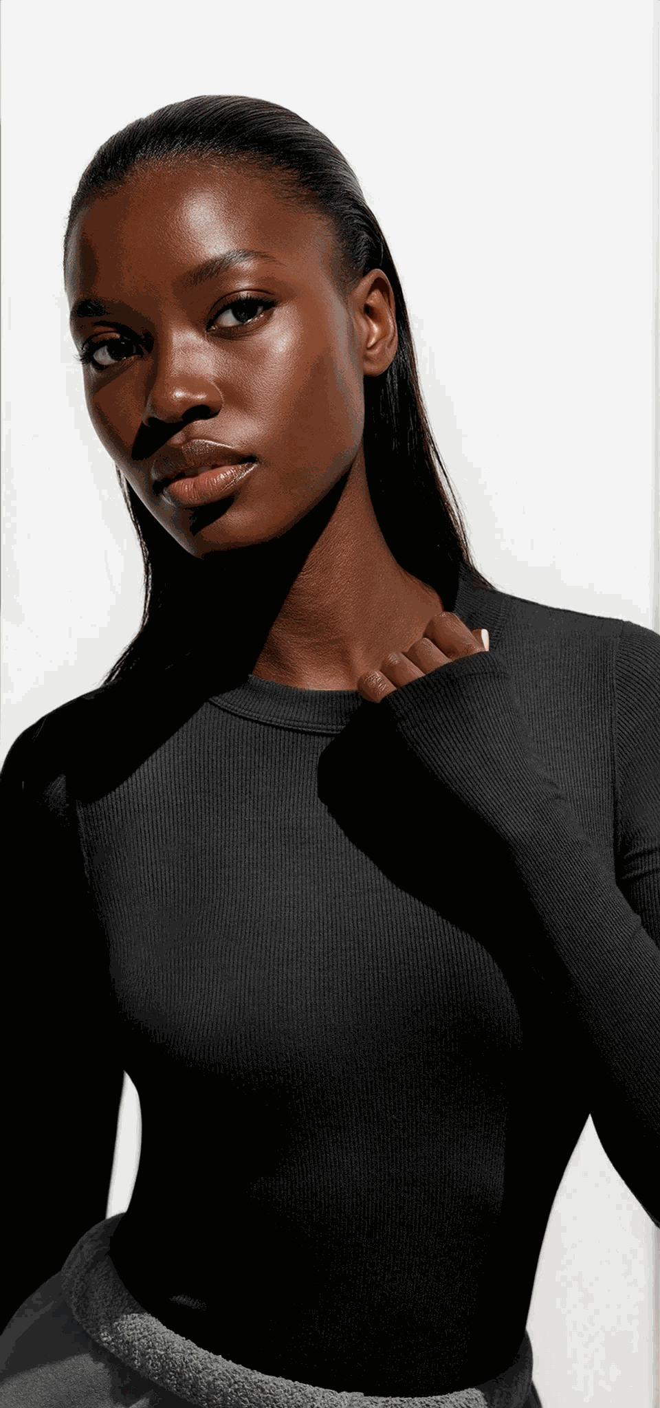 Black round neck long sleeve t-shirt on white background