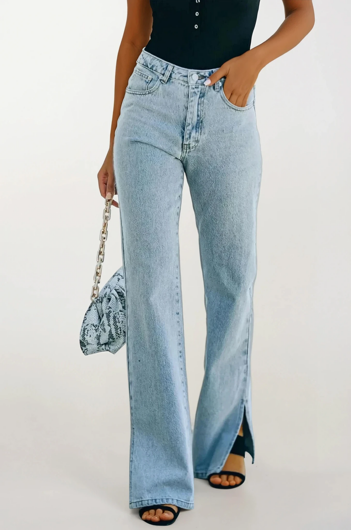 Side slit bootcut jeans with button closure and pockets in dark wash