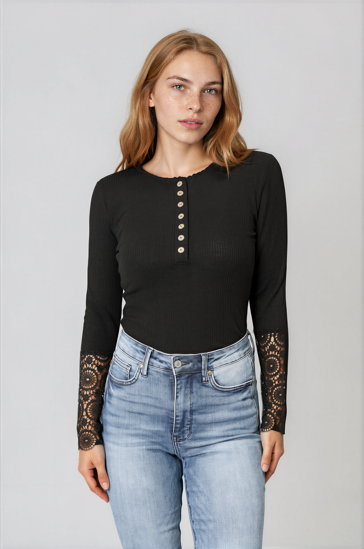 Spirit Crochet Lace Hem Sleeve Button Top in black ribbed fabric, with a round neckline, button placket and lace sleeve cuffs.