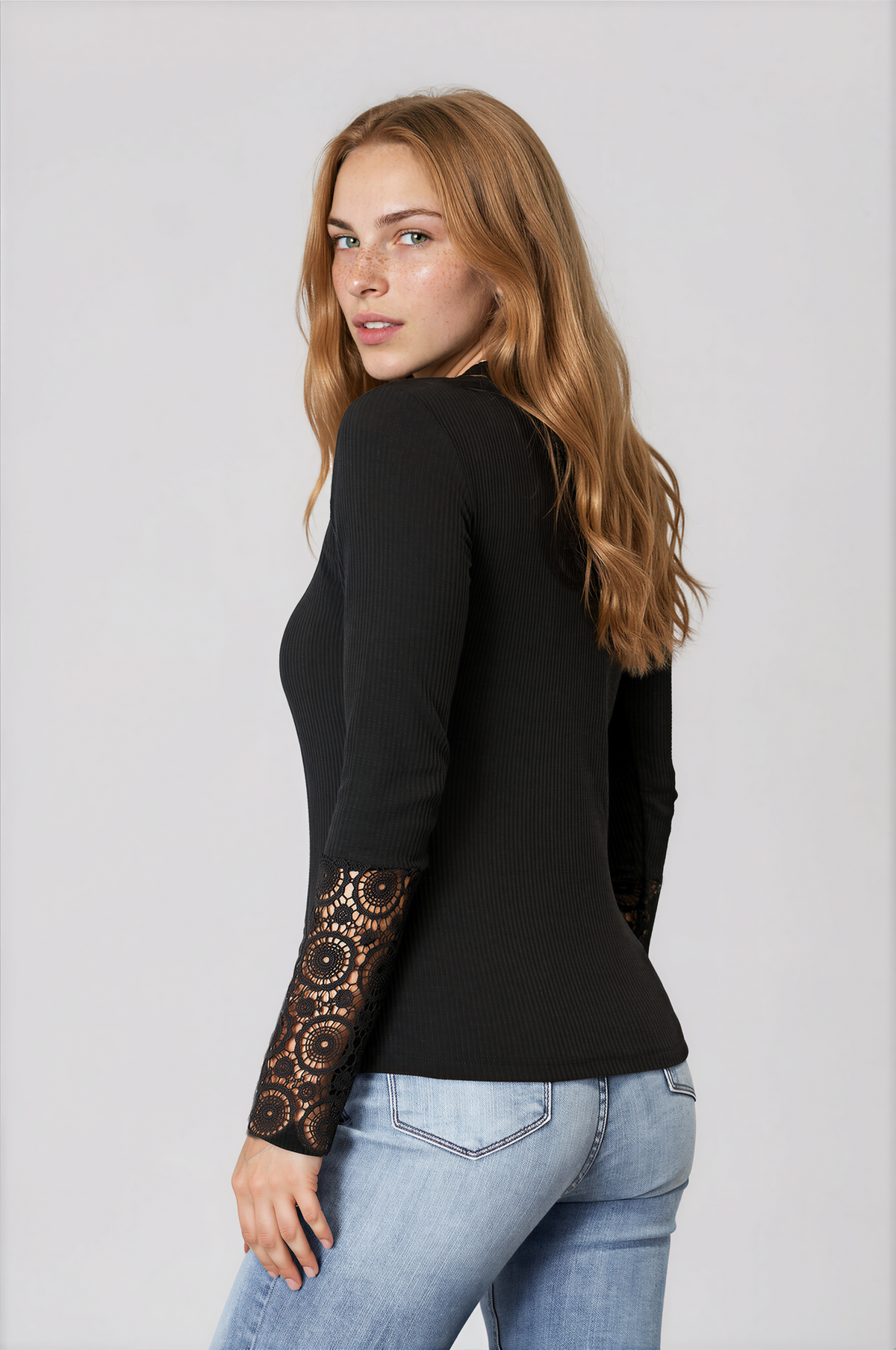 Spirit Crochet Lace Hem Sleeve Button Top in black ribbed fabric with sheer circular crochet lace sleeves and a fitted silhouette.