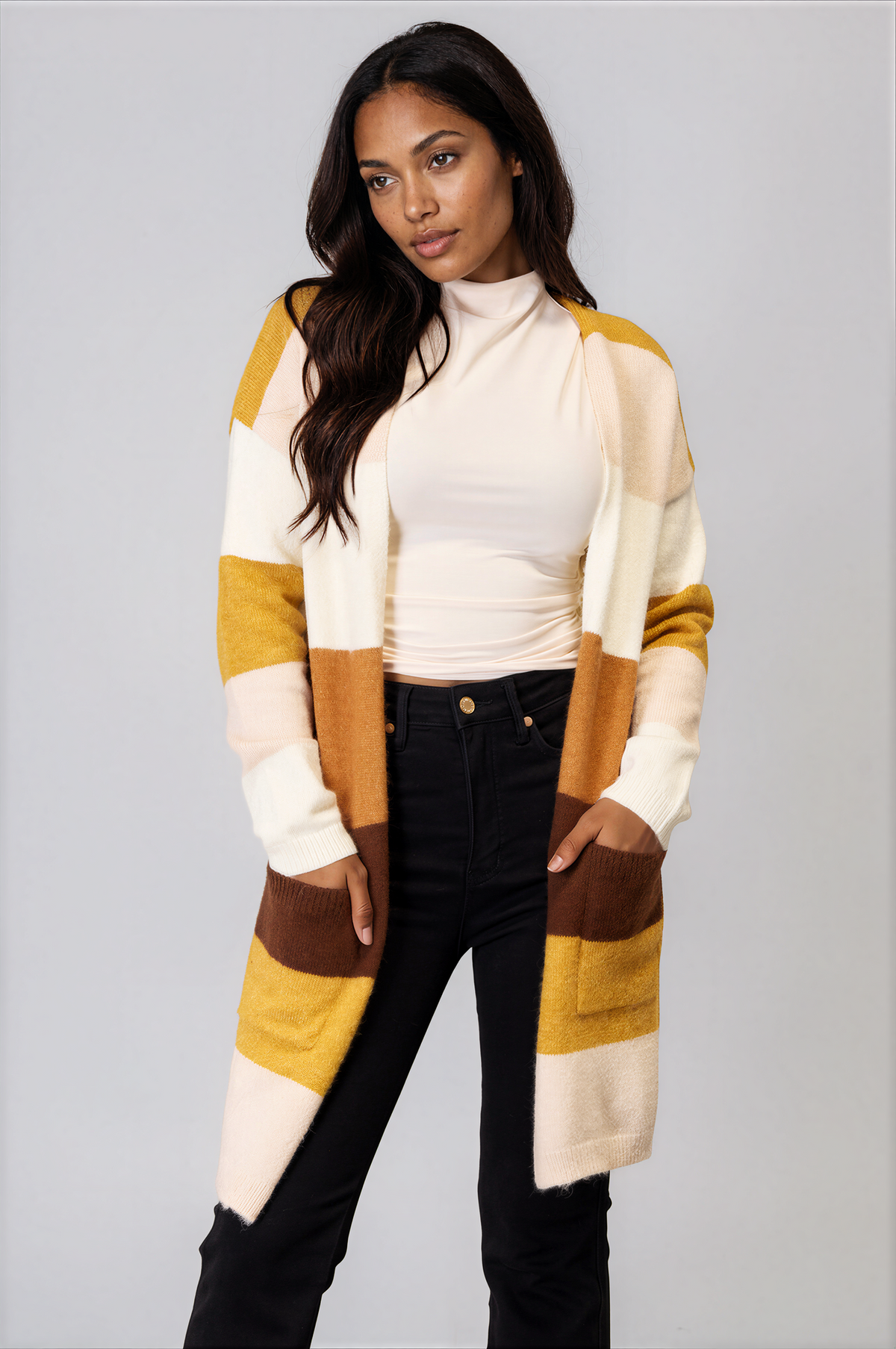 Stack Open Front Dropped Shoulder Cardigan in a soft knit with bold cream, mustard, and brown color-block stripes, long sleeves, and front pockets
