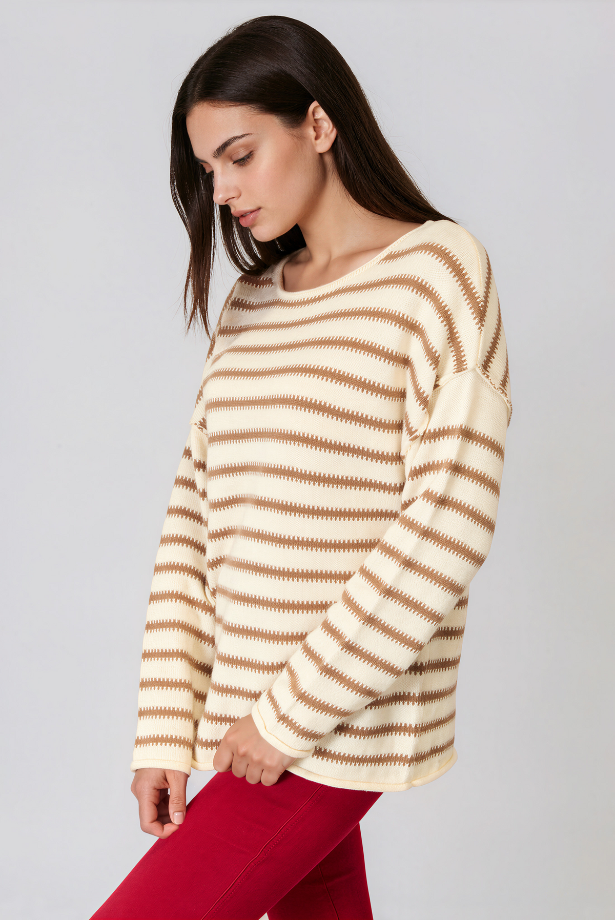 Striped Boat Neck Long Sleeve Sweater in cream with tan horizontal stripes, a wide neckline and exposed seams