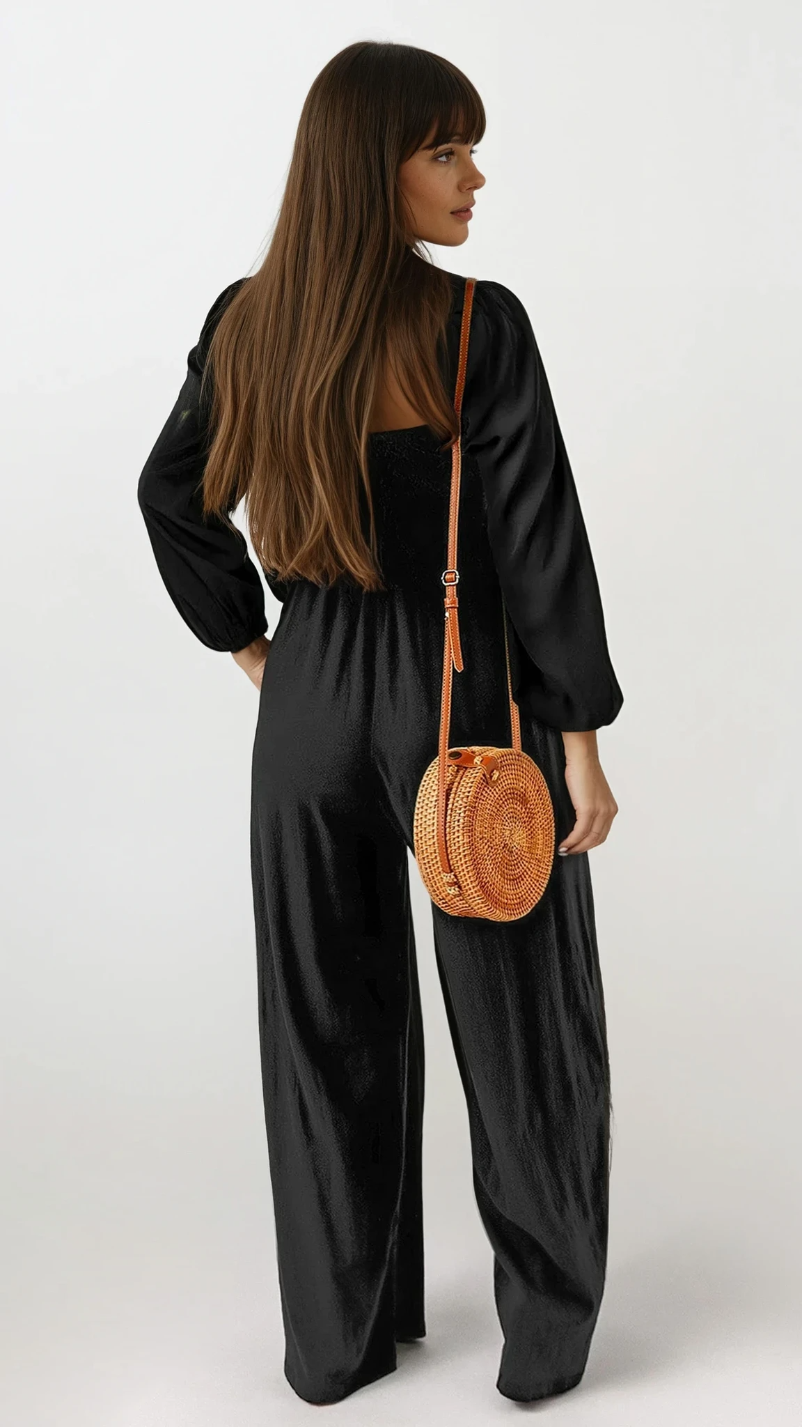 Black Unwind Square Neck Raglan Sleeve Jumpsuit by Trendsi, displayed on a model with a fitted waist and stylish design.