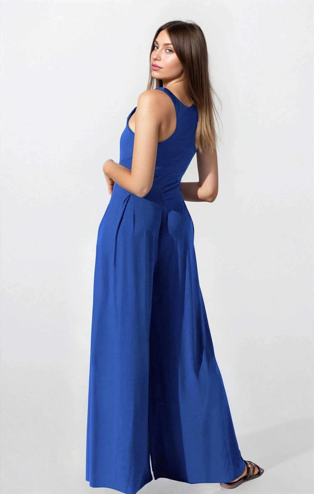 Camel Cosmopolitan square neck wide strap jumpsuit from Trendsi, stylish clothing with a fitted bodice and flowing wide-leg pants.