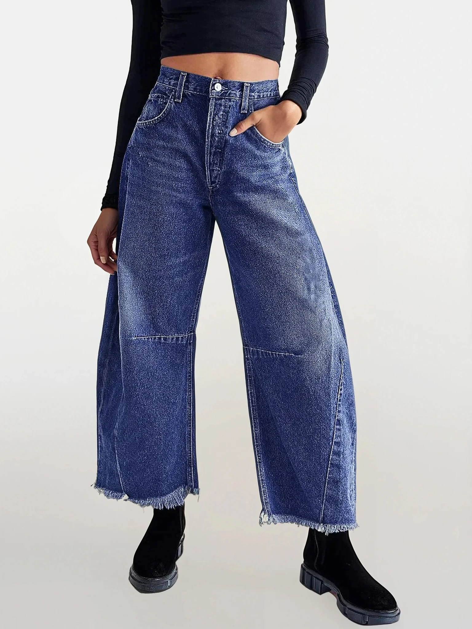 White stitched raw hem wide leg jeans by Trendsi, casual denim clothing with a relaxed fit and distressed hem detail.