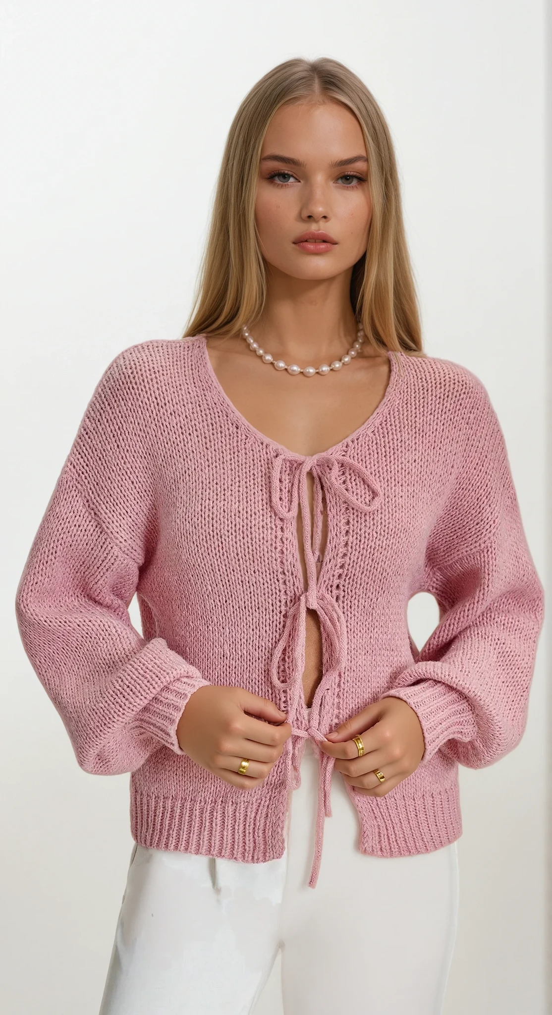 Lightweight triple tied cardigan with adjustable ties and solid pattern