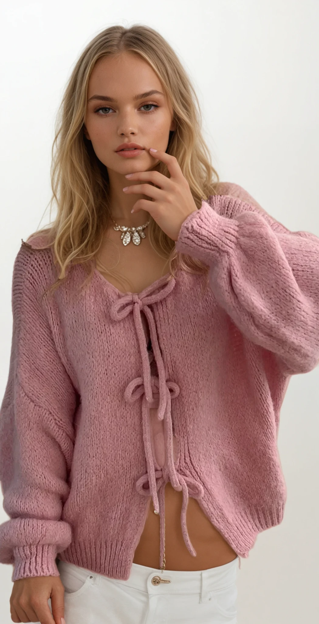Triple tied cardigan with adjustable ties and solid pattern