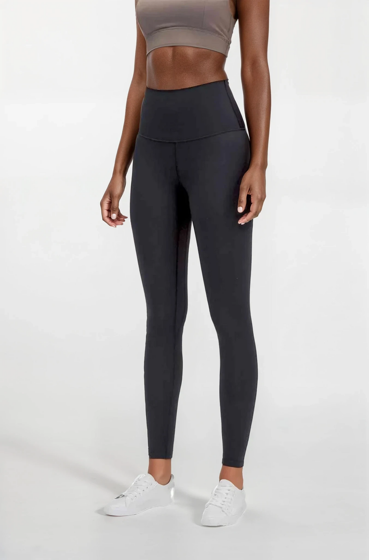 woman wearing ultra soft high-waist black leggings