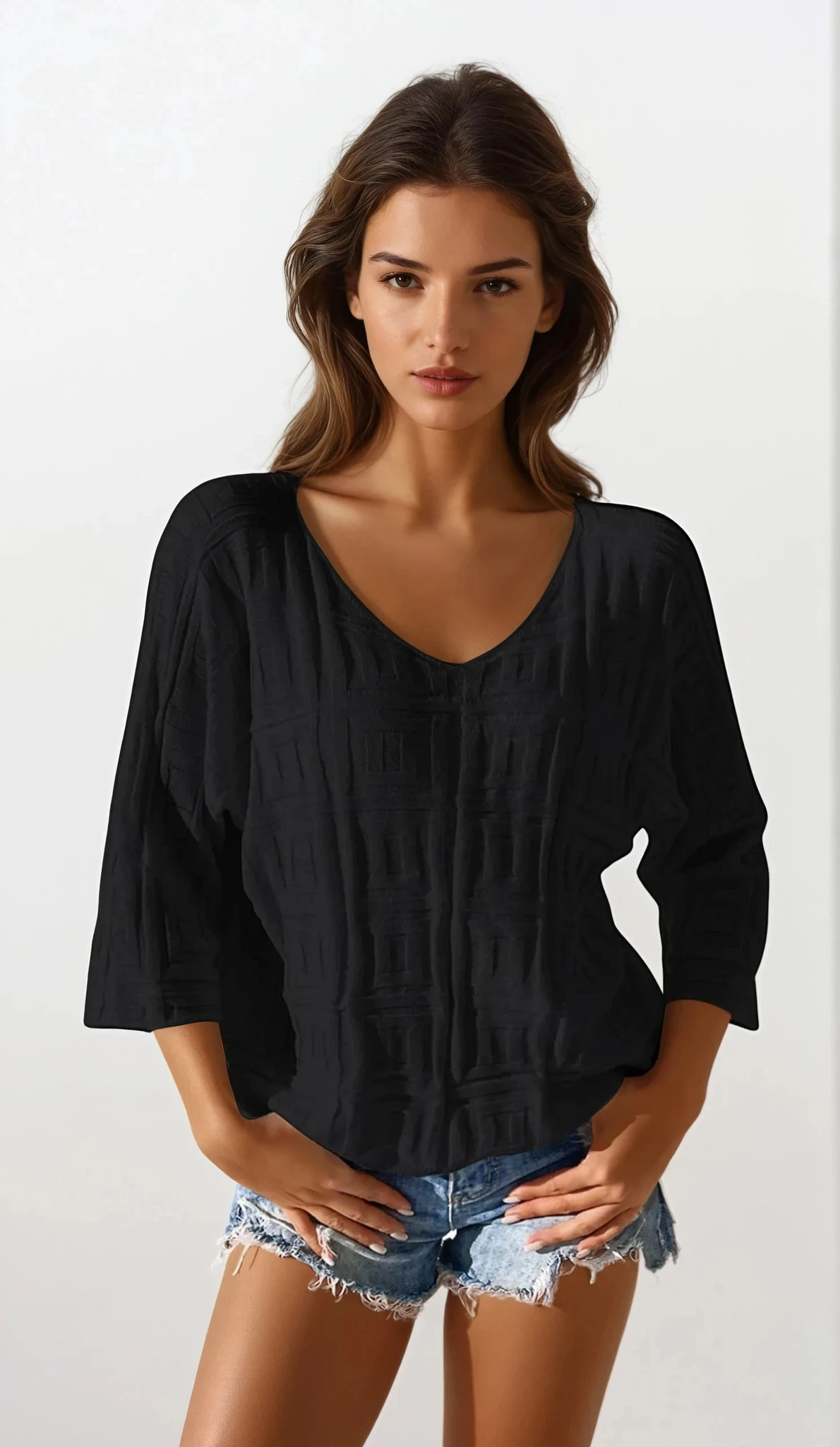 Maze V-neck three-quarter sleeve knit top with abstract pattern